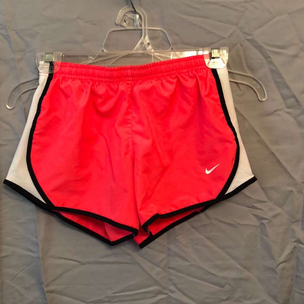 Pink Nike running shorts